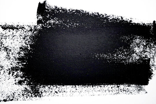Texture painted with a roller on the wall wet dark lino ink remain, black linocutting paint roller texture