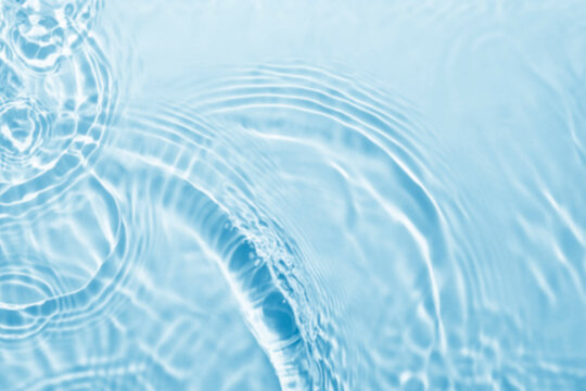 Closeup blurred blue sea background, top view surface blue water. abstract summer background.