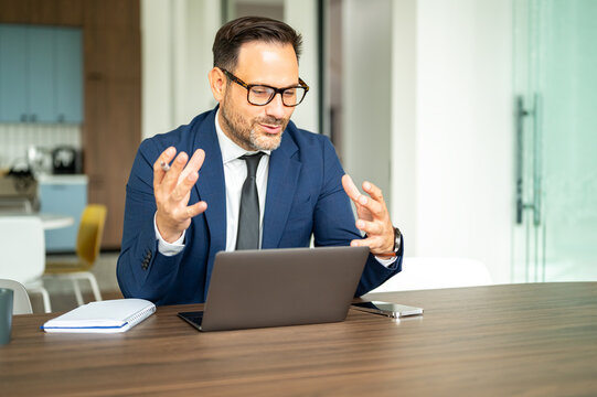 Business professional discussing strategies during a video conference, managing finances and legal matters with clients through online communication