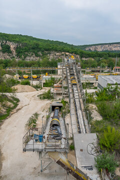Vertical perspective of conveyor belts at limestone quarry plant