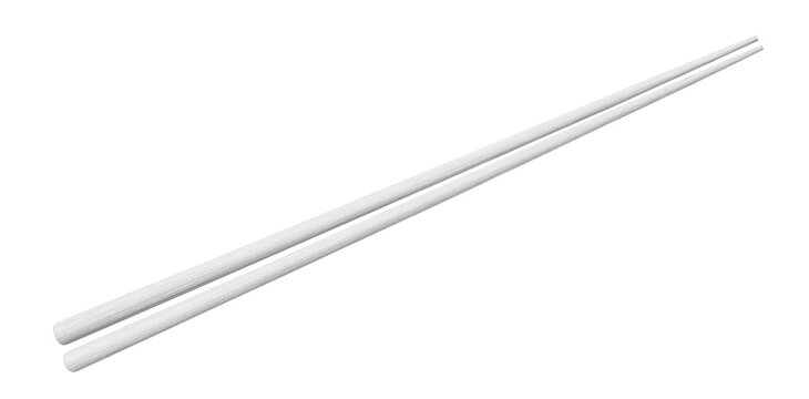 Pair of white chopsticks, arranged parallel diagonally, isolated on transparent cutout background