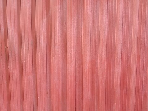 Red Corrugated Metal Texture Background with Vertical Lines