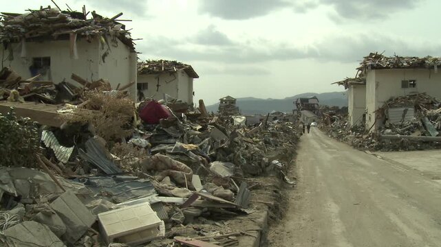 Town Wiped Out And Buried In Debris In Aftermath Of Tsunami In Japan