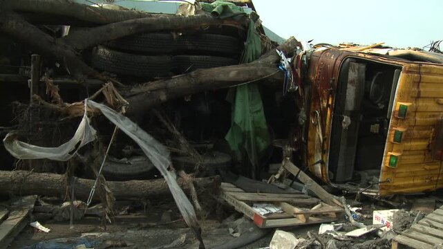 Wrecked Trucks And Debris In Aftermath Of Tsunami In Japan