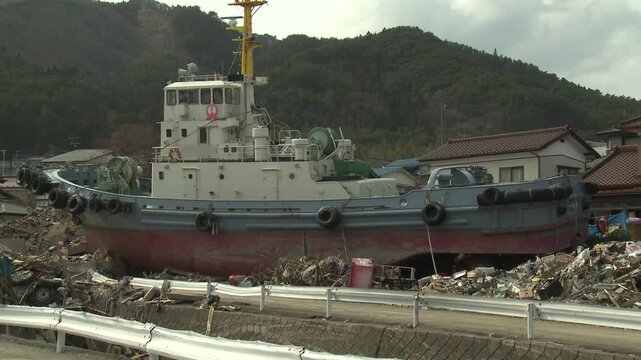Large Tug Boat Washed Ashore In Aftermath Of Tsunami In Japan