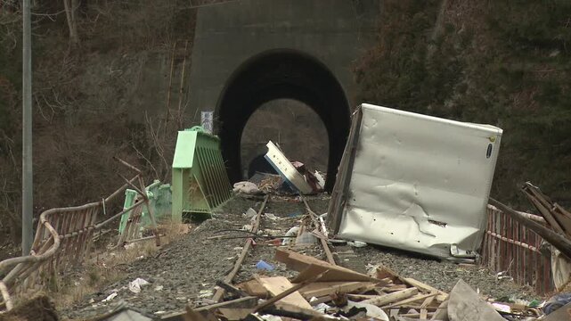 Large Debris Blocks Railway Tracks In Aftermath Of Tsunami In Japan