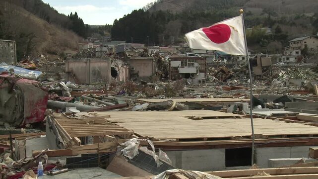 Japanese Flag Flies In Disaster Zone In Aftermath Of Tsunami In Japan