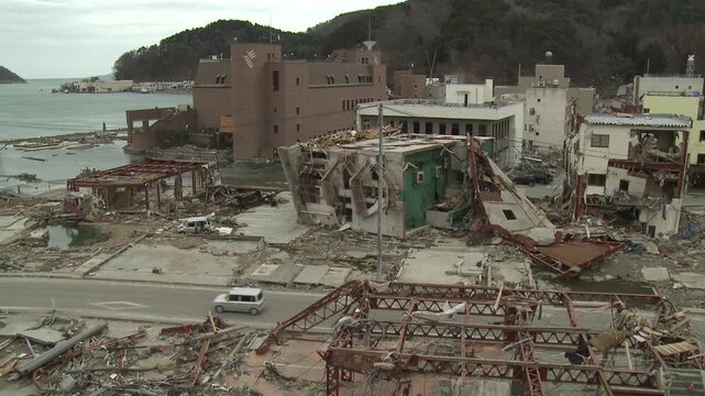 Heavy Damage To Large Buildings In Coastal Town In Aftermath Of Tsunami In Japan