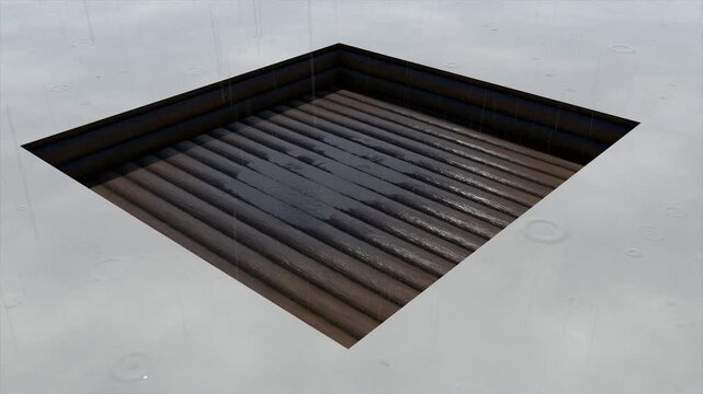 Rainy day on a metal grate drain, close-up view