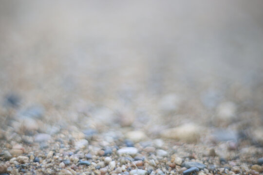 gray texture gravel pebble, bokeh, blur texture background, lens pattern vintage circular blur