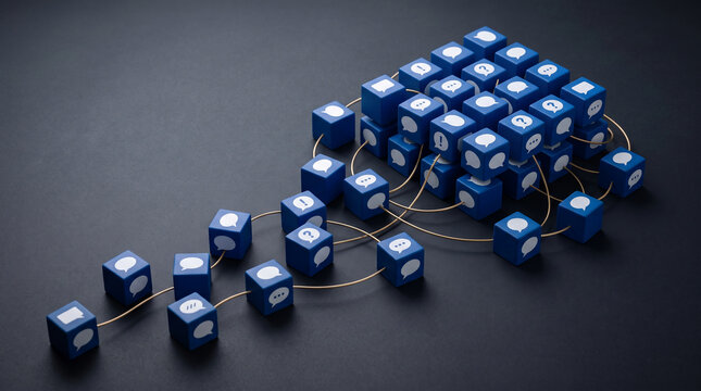 Blue cubes with communication icons, connected by thin wires, symbolizing network and dialogue, representative of digital interaction