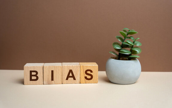 Wooden blocks with the word Bias. prejudice, personal opinions, preconceptions, stereotypes