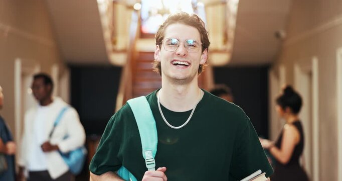 College student, face and man with books, education and laugh with scholarship for academic growth. Confident, portrait and happy person with glasses, knowledge and skill development in university
