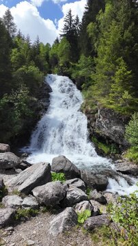 Rapid waterfall travel destination. Picturesque waterfall. Travel destination. Flowing stream. Scenery waterfall route. Nature mountain landscape. Waterfall landscape. Nature wildness