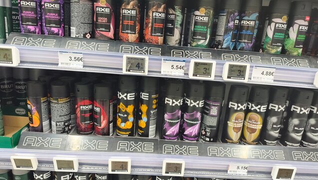 Royan, France - July 25, 2026: E.Leclerc ROYAN CEDEX. AXE brand deodorant spray cans arranged on a retail shelf with various scents and prices clearly visible in a store setting