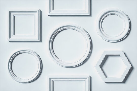 Various Shaped White Decorative Frames on Plain Background