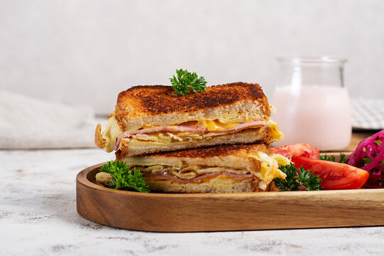 Toasted Breakfast Sandwich with Ham Cheese and Egg