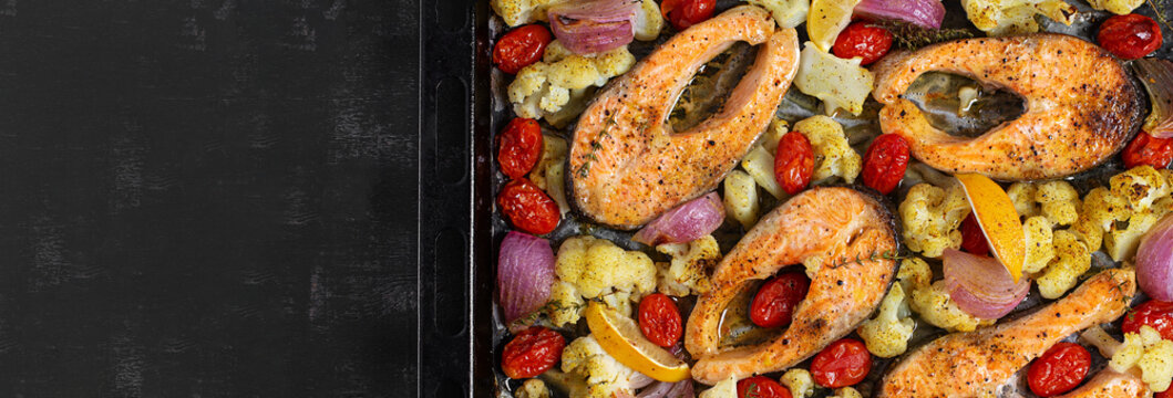 Healthy Seafood Meal with Roasted Salmon and Cauliflower. Top view, banner