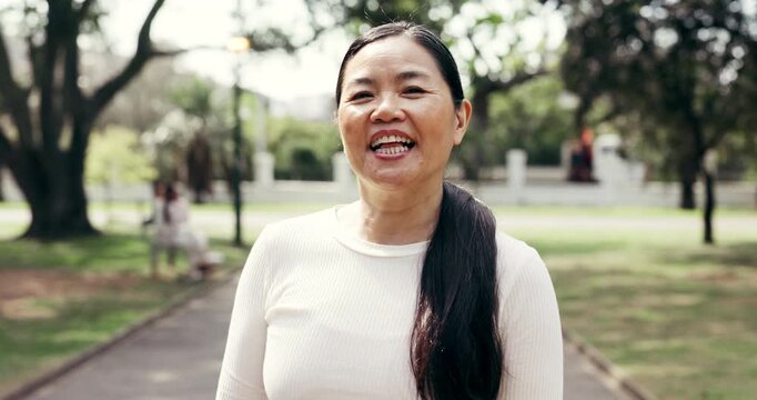 Outdoor, face and mature woman with fitness for active wellness, self care benefits and smile. Runner, funny Asian person and exercise lifestyle at park with portrait, laughing and longevity