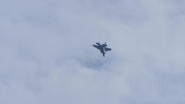 F-35 fighter jet doing an air brake maneuver