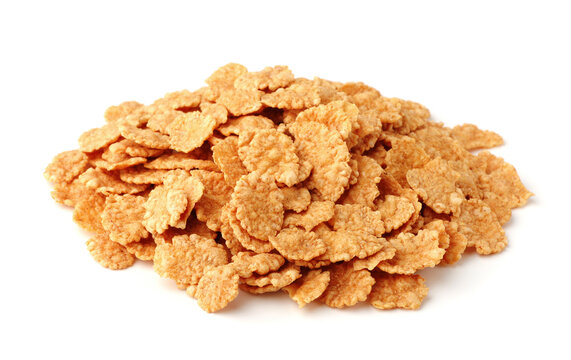 Heap of crispy golden buckwheat cereal flakes