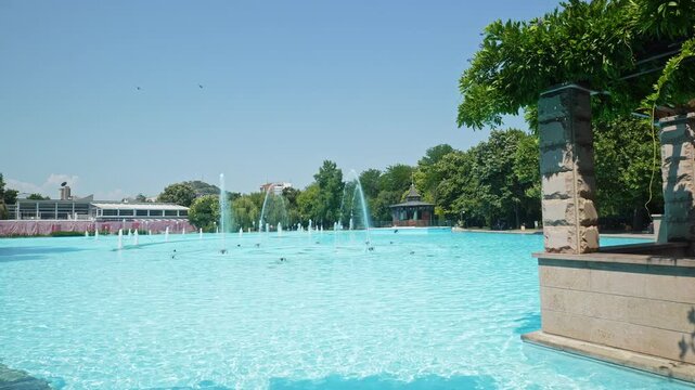 Clear blue water in the Singing Fountains at Tsar Simeon Garden in central Plovdiv, Bulgaria.