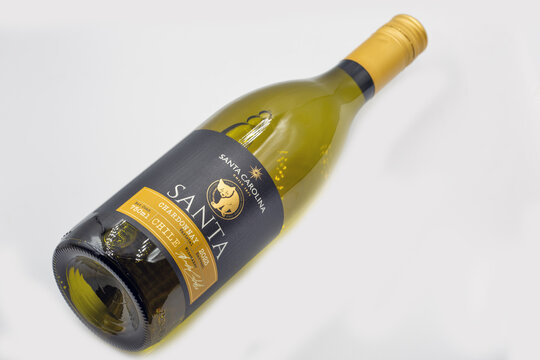 Santa Carolina Chardonnay 2023 Chilean wine bottle closeup on white.