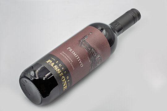 Luce di Passione Primitivo Italian wine bottle closeup on white.