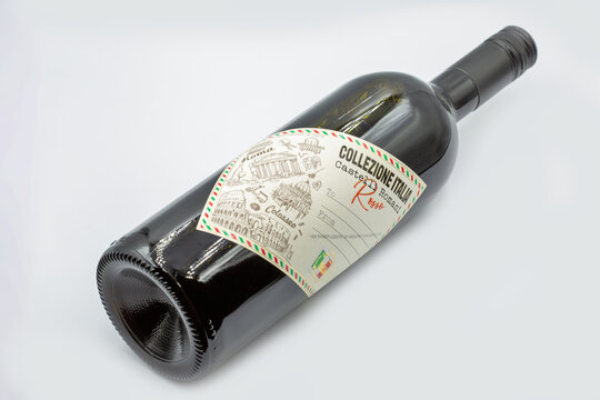 Collezione Italia Castelli Romani red wine bottle closeup on white.