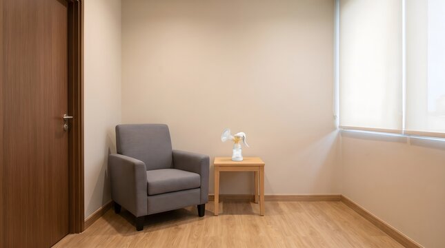 Quiet lactation room with a cushioned chair, breast pump on a side table, closed door and covered window, showing a private workplace space for expressing milk.