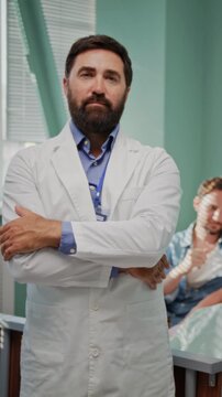 Doctor stands confidently during supportive family hospital visit
