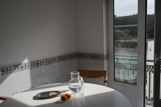 Sunny Portuguese Dining Room Interior with Azulejo Tiles and River View