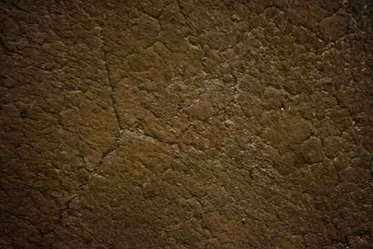 Cracked Weathered Wall Surface with Peeling Plaster Texture