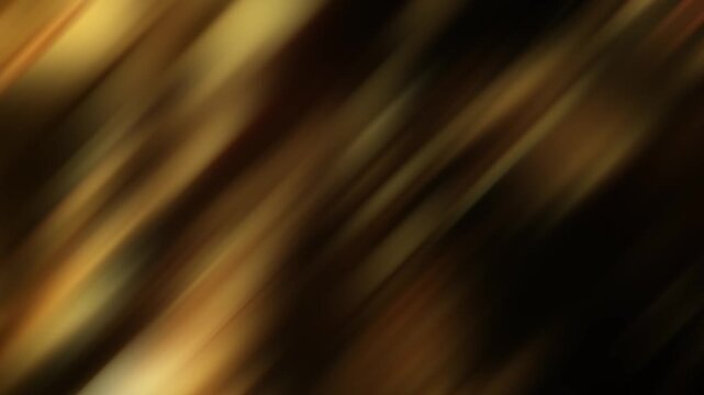 Diagonal streams of golden light move continuously across a warm defocused background in a seamless loop.