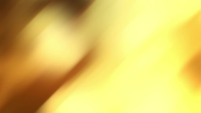 Diagonal streams of golden light move continuously across a warm defocused background in a seamless loop.