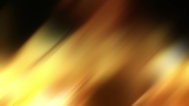 Diagonal streams of golden light move continuously across a warm defocused background in a seamless loop.