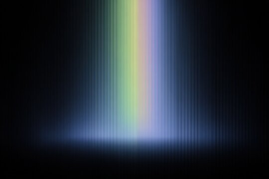 A rainbow in the dark with a black background