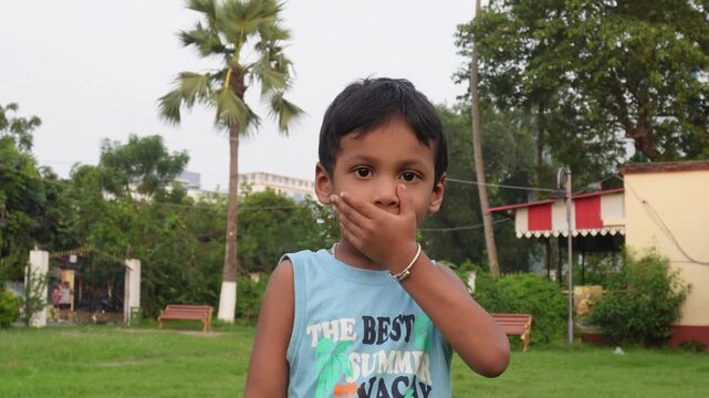Young child enjoying a playful summer moment outdoors