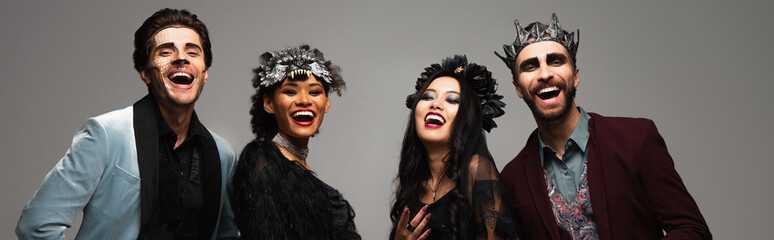 Obraz premium Multicultural friends celebrate Halloween with costumes at a lively party, banner 