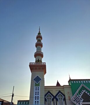 Beautiful minaret of the Great Mosque of Tegal City against clear blue sky