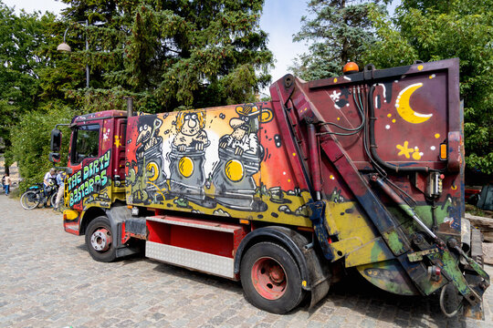Graffiti covered garbage truck in Christiania community.