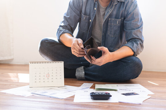 Stressed, Problem people asian woman hand holding and open an empty wallet not have money, credit card, not to payment bill, loan or expense in pay. Bankruptcy, bankrupt and debt financial concept.