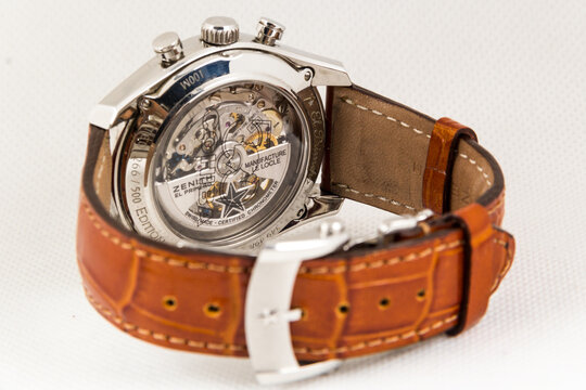 Luxury Zenith El Primero Chronomaster Cohiba edition chronograph watch featuring open-heart dial, tachymeter bezel, steel case, and brown leather strap.