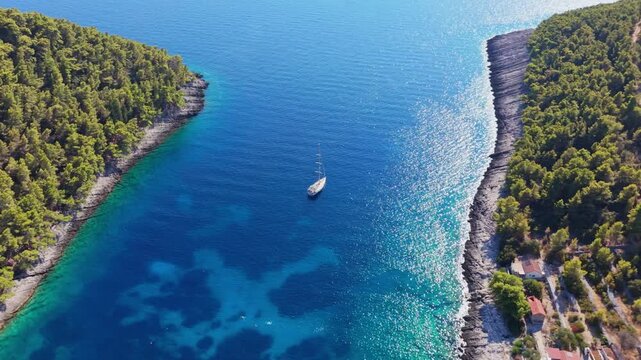 Aerial View of a Sailboat in the Blue Waters of Pupnatska Luka Bay on Korcula