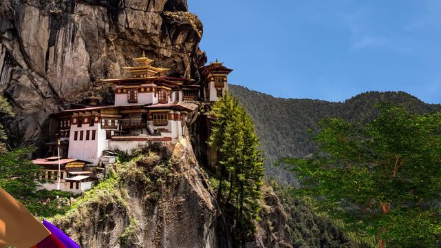 Tiger Nest Monastery Paro Taktsang in Bhutan on a Dramatic Himalayan Cliff Paro Taktsang Tiger Nest Monastery in Bhutan with Himalayan Mountains Famous Paro Taktsang Buddhist Monastery in the Himalaya