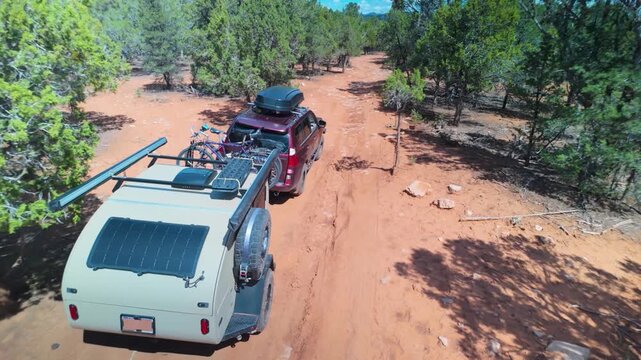 Journey over rocky dirt paths in Utah&rsquo;s Zion National Park, as a teardrop trailer is towed through stunning landscapes.