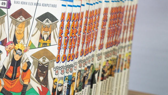 SOUTH KALIMANTAN, INDONESIA - SEPTEMBER 30, 2026: An extreme closeup shot shows the front cover artwork of Naruto comic book volume 49 published by Buku Komik Elex Media Komputindo.