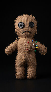 Voodoo Doll with Pins on Black Background, Spooky Witch's Apothecary Prop, Halloween aesthetic  