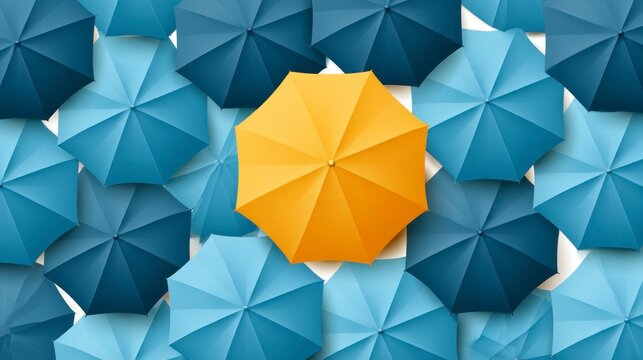 Yellow umbrella standing out from a crowd of blue umbrellas, concept for individuality, leadership and being unique