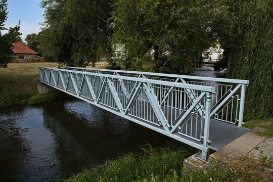 Footbridge over water channel "Dyjsko-mlynsky nahon" in Slup,Czech Republic,Europe
